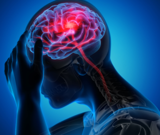 Illustration of a person with migraine holding their head, representing whether migraine can be cured permanently